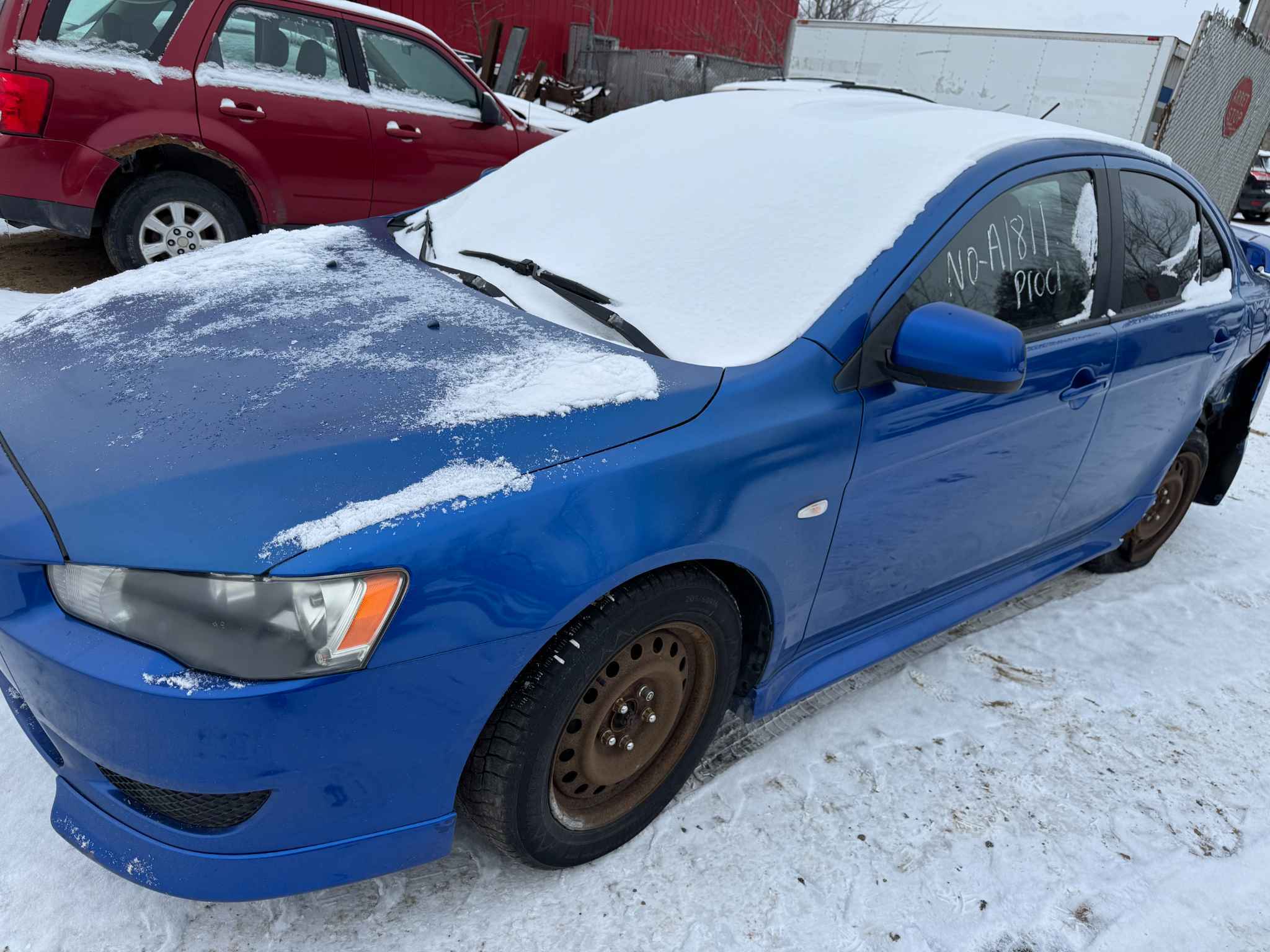 2011 Mitsubishi Lancer (Mits.)